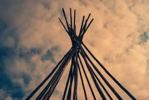 Teepee supports seen at dusk